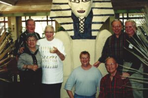 Austin Opera’s "Aida Opening Night Gala Dinner" in 2000. Left to right: Dr. Paul Glass; Jeanette Nassour; Ellen King - Austin Opera Guild VP of Special Events; Patrick Landrum, event designer (kneeling); Harry Ullmann (kneeling) and Pete Schram (above him), Event Chairs; Earl Covington. In the background is a sphinx that they borrowed for the dinner.