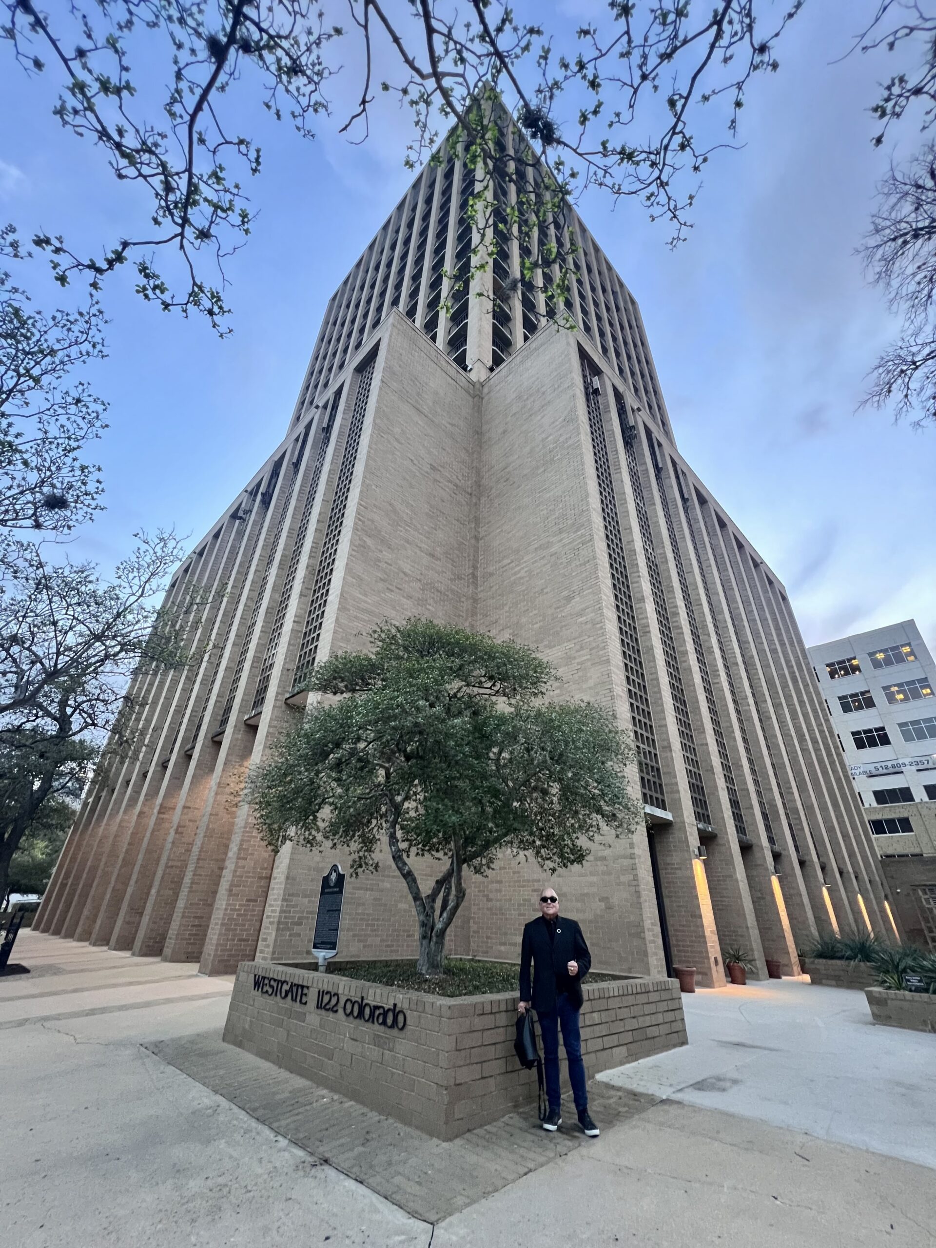 Charles Peveto outside the Westgate Tower, where he lives.