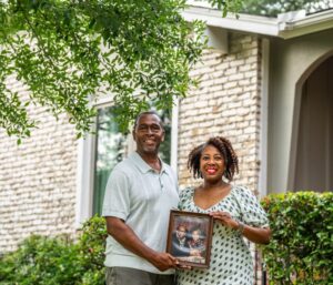 The Dr. Sidney, Jr. and Helen F. White House received a Stewardship Award. Recipients Lamont and Alta Alexander are shown with the award. Photo credit: Mikala Compton, Austin American-Statesman