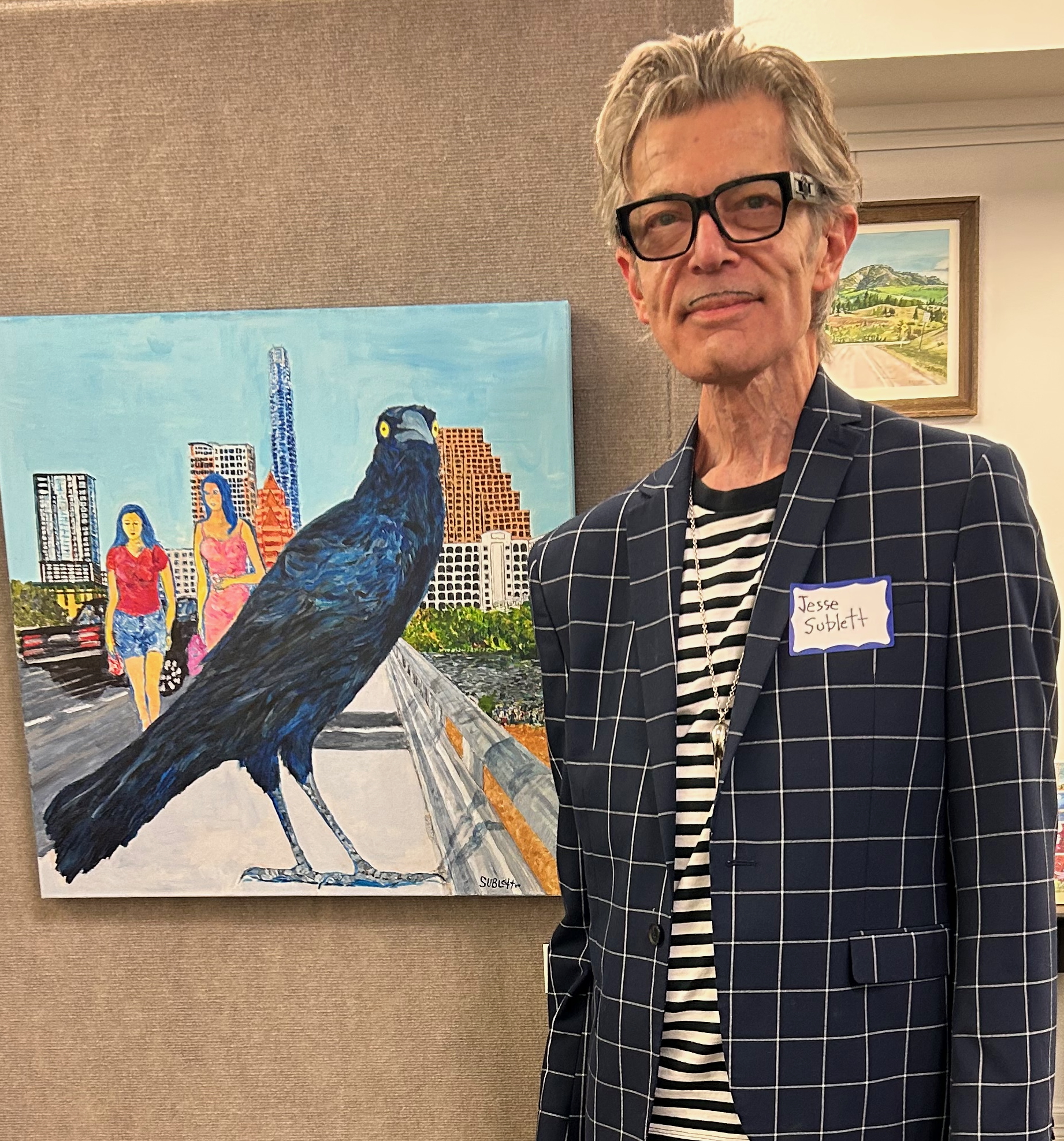 Jesse Sublett with his painting “Famous in Austin.”
