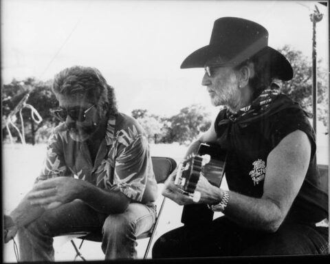 Michael with Willie Nelson on a shoot for the Don’t Mess With Texas campaign