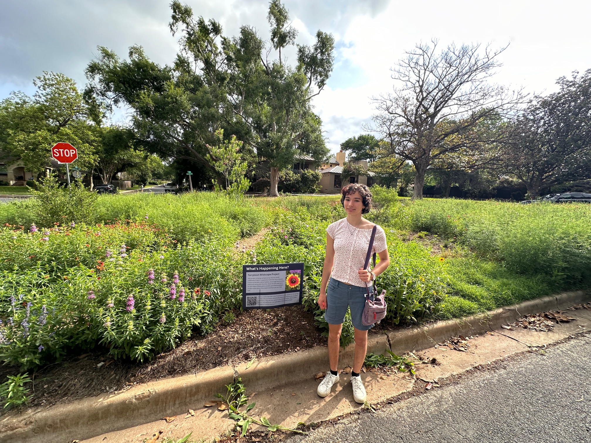 Juliette Madere on a recent weekend morning, doing maintenance on her rewilding garden in West Austin. Photo by Forrest Preece.