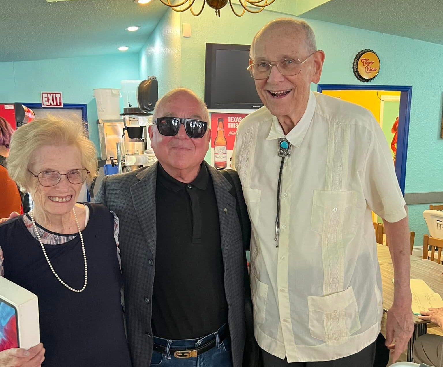 Charles Peveto (center) with Lynn and Frank Cooksey at Juan in a Million restaurant.