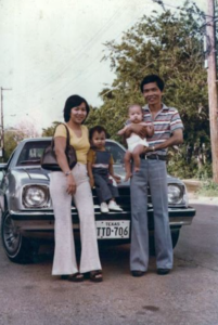 A photo from 1981, two years after Janice’s parents arrived in the US. Her mother is wearing bell bottoms that she made herself and they are standing in front of their first car. Left to right – Fuong Ha, Janice Ta, Thomas Ta, and Duong Ta.