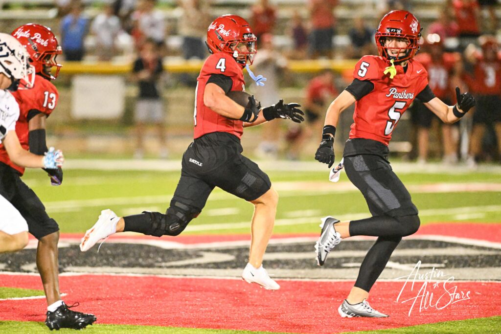 Senior Houston Shaw (ATH, #4) runs in a touchdown covered by Senior Xander Duncan (K/WR, #5)