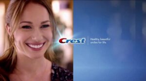 Kelly in an ad for Crest toothpaste