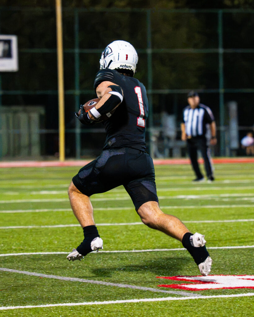 Senior Malachi McNeely (RB, #1)