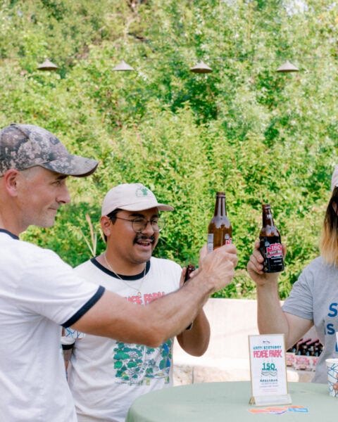 Bret Kiester, George Rojano and Dalton Smith toast to 150 years