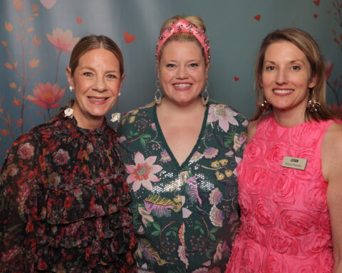 Red Haute Chair Amy Hoge Hajdu, WSL VP of Finance & Development Julia Null, and WSL President Melanie Mahaffey