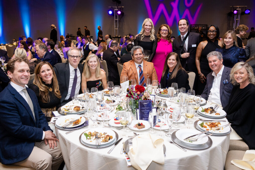 Front row, L-R: Garrett Key, Laura Key, Jarrett McGehee, Kristen Jaros, David Saenz, Sondra Saenz, Brian Robertson, Pamela Robertson, Back row: Shelly Metschan, Dr. Leigh Ellis, National Director of Development and Outreach Brent Metschan, Michelle Dacres Green, and Lisa Smith