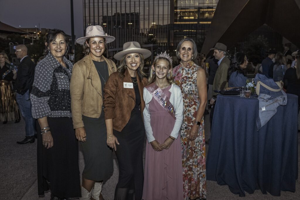 Chief Operating Office Kristin Coulter with Sumner family