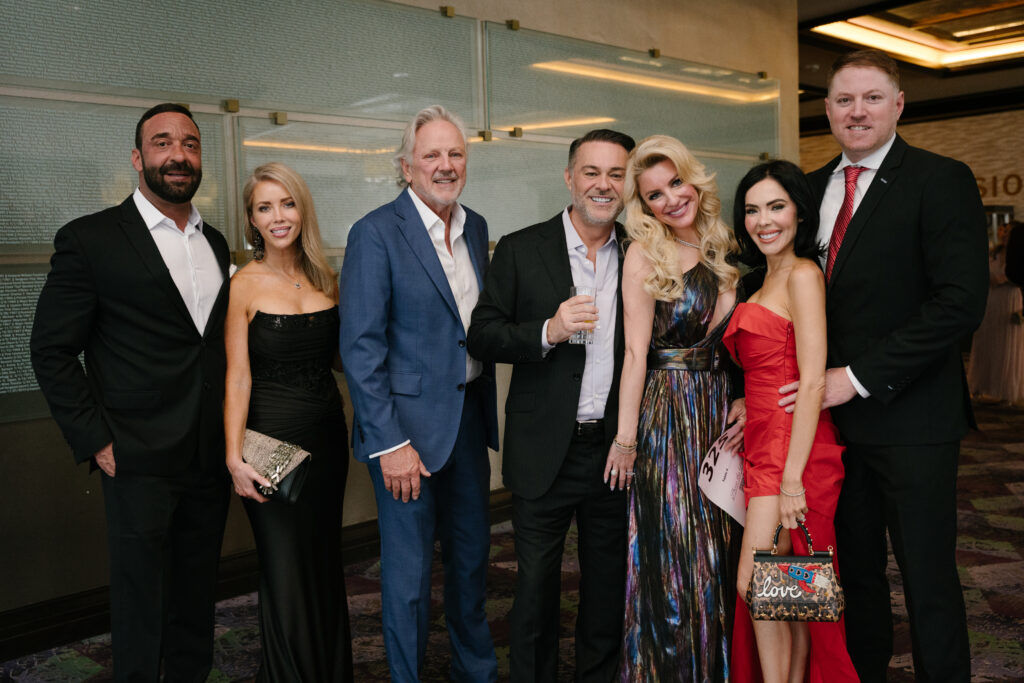KC Schuldes, Bailey Jones, Gene Schneider, Ray and Julie Maples, and Mike and Jaclyn Roediger