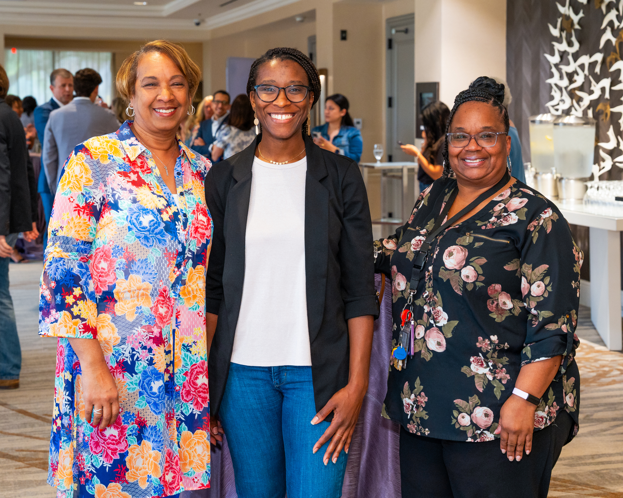 Housing Authority of the City of Austin staff Charelesa Russell, Dominique Green, and Veronica Riggins