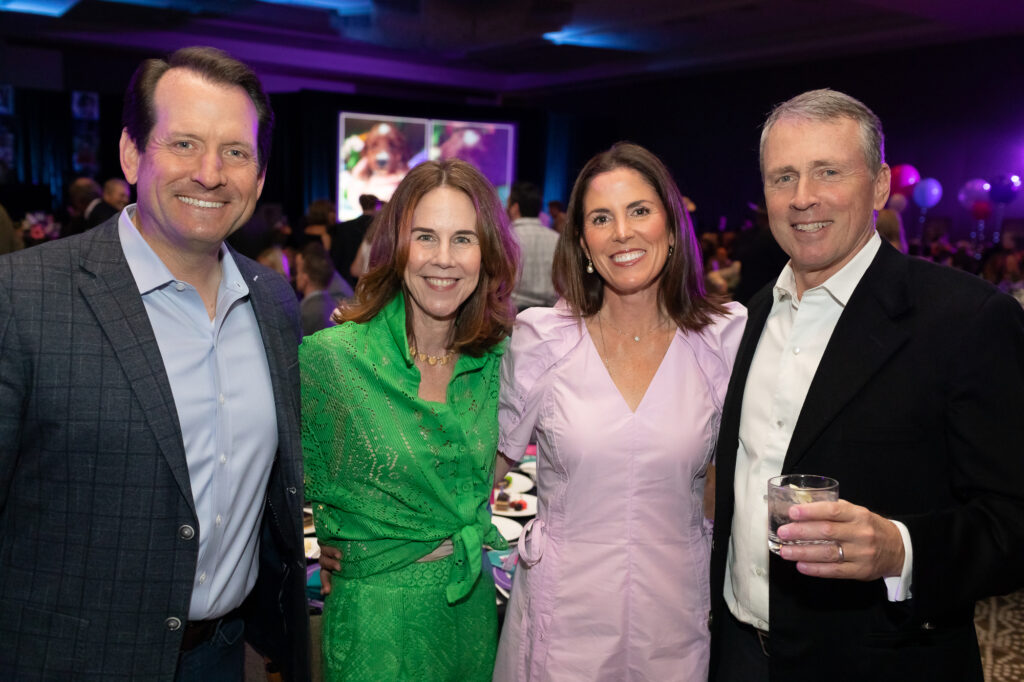 Chairman of the Board Stephen Garrison, Past Chairman of the Board Maryann Bell, Sarah Garrison, and Paul Bell