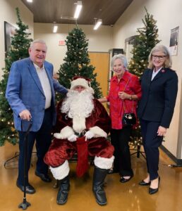Dick Rathgeber, Santa (Major Lewis Reckline), Sara Rathgeber, and Major Jacqulyn Reckline