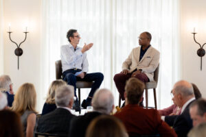 Dr. Hunt Batjer and Mike Singletary speaking to luncheon guests
