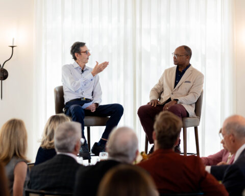 Dr. Hunt Batjer and Mike Singletary speaking to luncheon guests