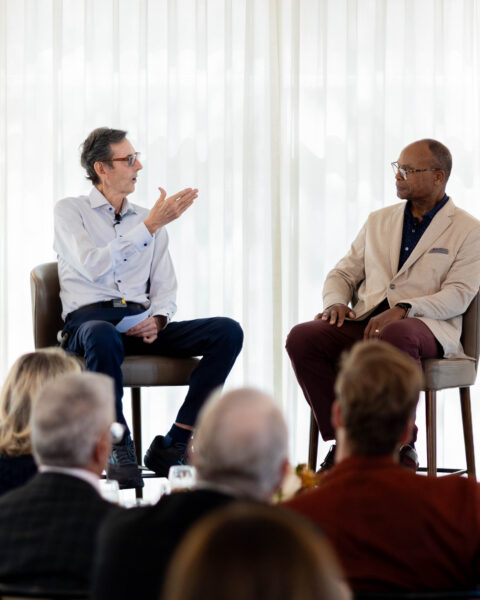 Dr. Hunt Batjer and Mike Singletary speaking to luncheon guests