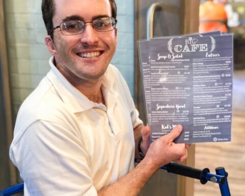 BiG Citizen Bradley ready to greet guests at the BiG Cafe during his shift