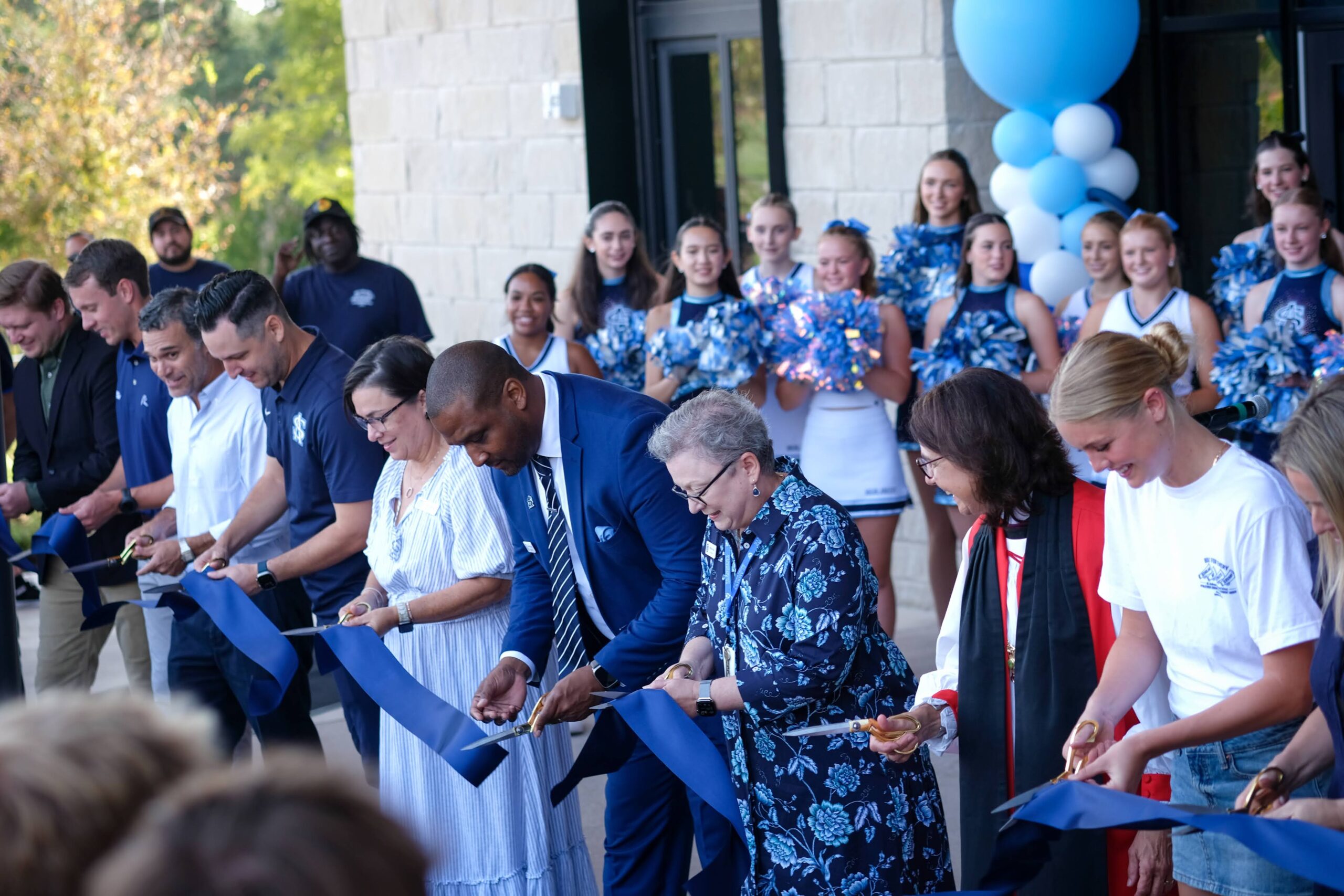 Ben Hamilton (LPA Architects), Dawson Merrill (Harvey Cleary Builders), Sean Greenberg (Board Chair), Thomas Sale (Athletic Director), Alice Nezzer (Assoc Head of School), Dr. Steven Fletcher (Head of Upper School), Melissa Grubb (Head of School), The Rt. Rev. Kathryn M. Ryan, Bishop Suffragan, Ava Barnard ‘26 (Student Senate President)