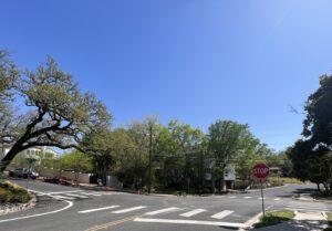 Newly installed stop signs and crosswalks at Hillview and Greenlee