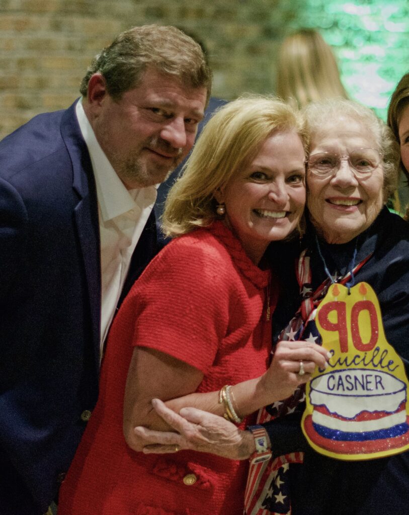 Drew and wife Misty Tate with Casner Christian Academy founder Lucille Casner at the annual Red, White & Blue fundraising event