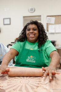 BiG Citizen Briana rolling an imprint into raw clay