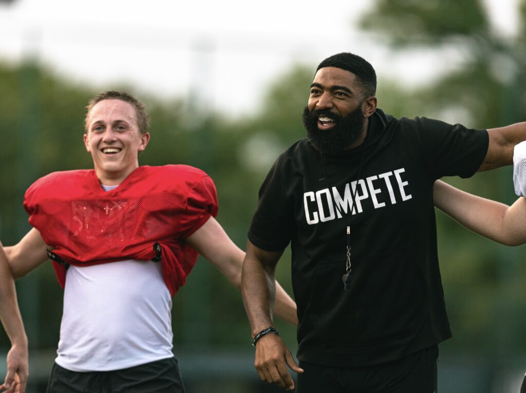 Noah Manning with Coach Roby at the Spring Football Game