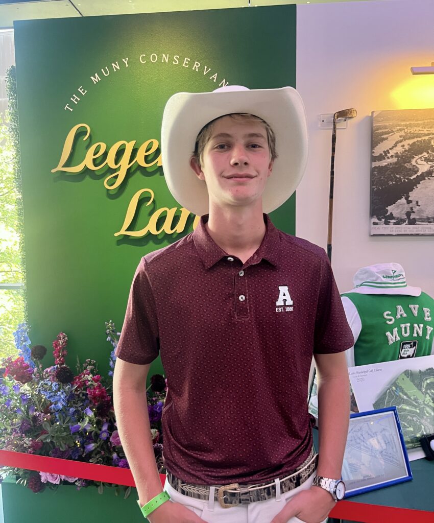 Austin High Golf team member Barclay Dekinder, volunteering at the gala