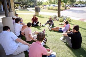 Middle School bible study on the lawn at the Bee Caves Campus