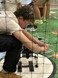 Henry Hubbard setting up the drone for round 1 competition