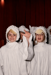 Misty Mullen Tate and Christen Chapman, circa 1976, playing the role of the doves in Casner’s Friendly Beasts Christmas program