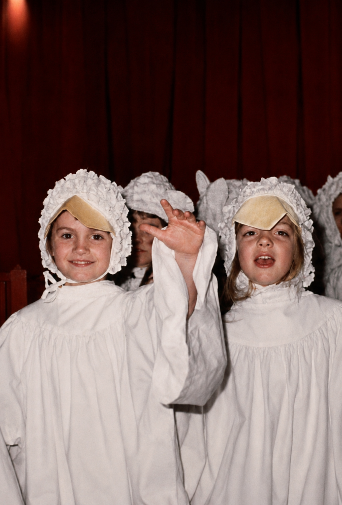 Misty Mullen Tate and Christen Chapman, circa 1976, playing the role of the doves in Casner’s Friendly Beasts Christmas program