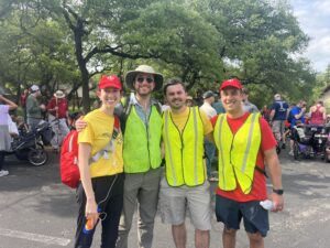 Pilgrimage First Aid Coordinator Dr. Ellen Gaudet Urrutia and Pilgrimage MC Nicholas McCann, Pilgrimage Director Francisco Carrillo with Gabriel Urrutia
