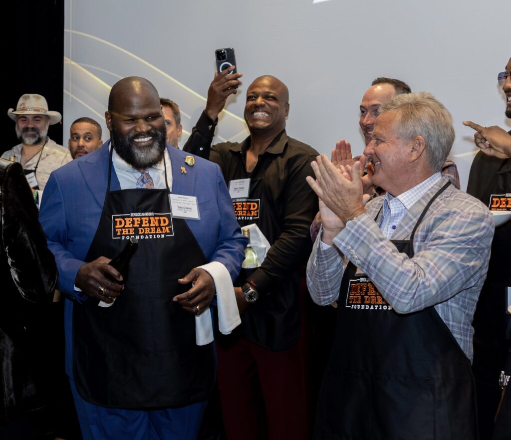 ”World's Strongest Man” Mark Henry serving at Celebrity Waiter Night