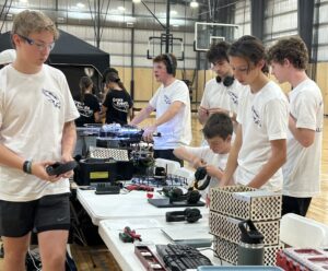DJ Dahill, Henry Hubbard, William Radtke, Douglas Gibbons Jr., Chris McGlathery, and Wolfgang Peterson preparing for competition