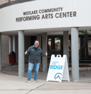 Austin Ridge staff member TJ Morelli outside the new Westlake location