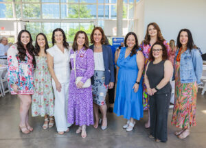 Victoria Gonzalez, Becky de Haro, Jamie Olson, UW Board Chair Kristin Marcum, Cheryl Katon, Levente McCrary, Lindsey Woods, Yael Lawson, and Lauren Hammonds