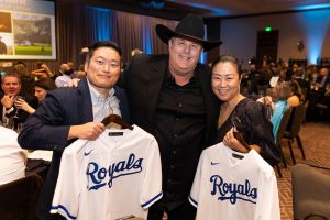 John Ku, Kansas City Royals Vice President of Major League Scouting/Assistant GM Gene Watson, and Lillian Ku