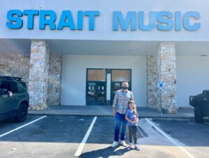 President/Owner of Strait Music Company Clint Strait, and son Leo