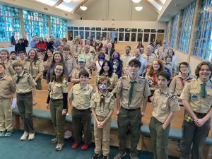 Scouts and leaders of Troop 410, Pack 55, Troop 2019, Sea Scout Troop 410